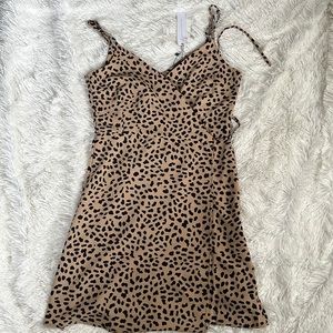 NWT! Animal print wrap dress! 100% polyester